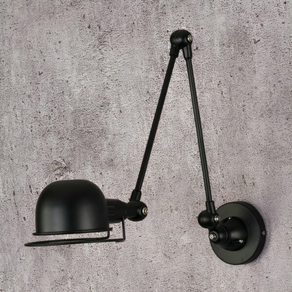 Adjustable retro black industrial LED wall light on grey background