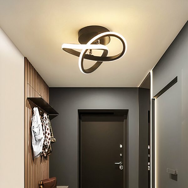 Minimalist, modern black LED bathroom ceiling light on a grey background