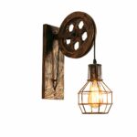 Vintage metal wall light in industrial style on a white background