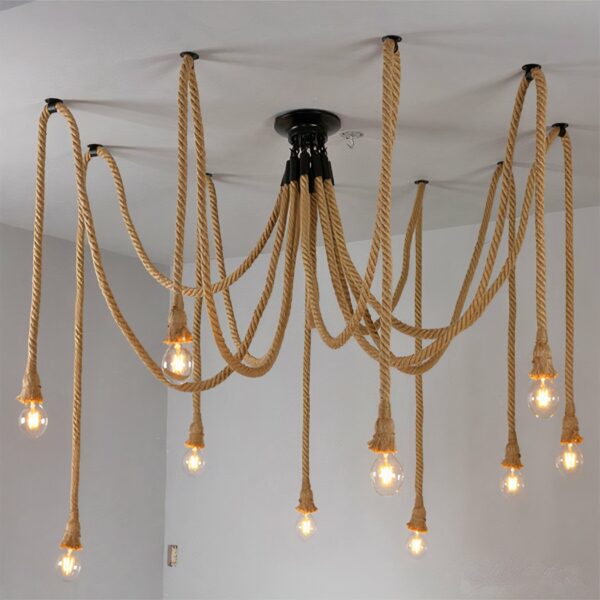 Vintage rope spider hanging presented on a grey background