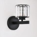 Luxurious Nordic design LED wall light in stainless steel and crystal on a grey background