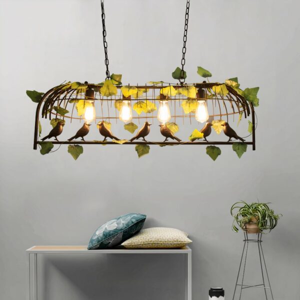 Suspension Bird open birdcage with foliage presented suspended above a bench