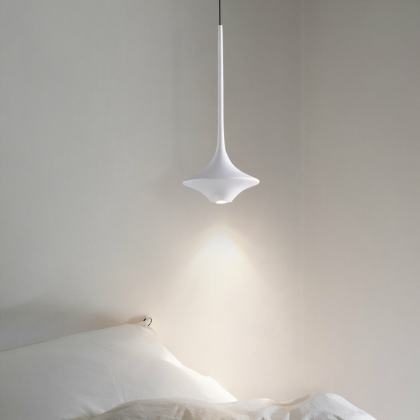 Simple Nordic minimalist design hanging lamp presented near a bed