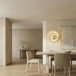 Circular LED wall light in aluminium with light projection