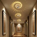 Circular LED wall light in aluminium with light projection