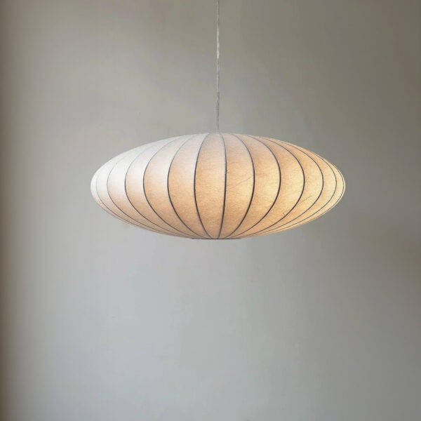 Oval pendant light with a finely ribbed white natural fibre shade