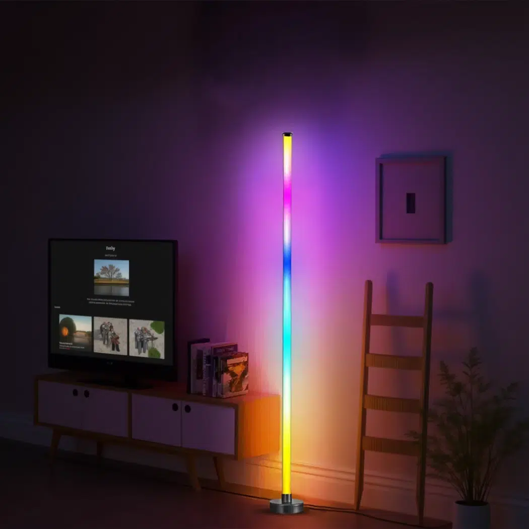 Rainbow LED floor lamp glowing beside a TV stand and wooden ladder