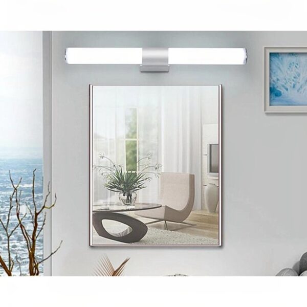 Chrome LED bar wall light mounted above a bathroom mirror