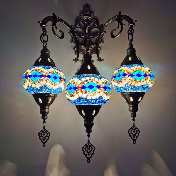 Wall light with three hanging mosaic glass globes in blue and gold
