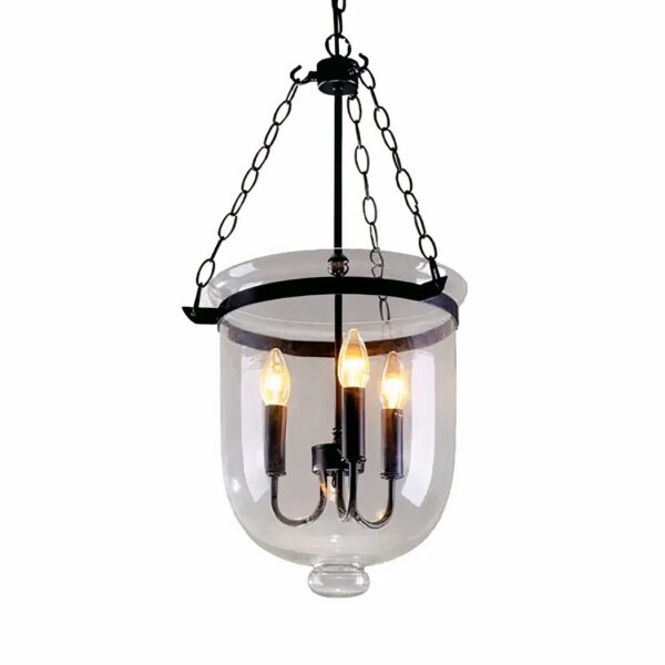Black three-candle chandelier enclosed in a clear glass bell jar shade