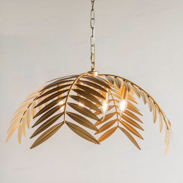 Gold leaf shaped chandelier with layered palm frond details and exposed bulbs