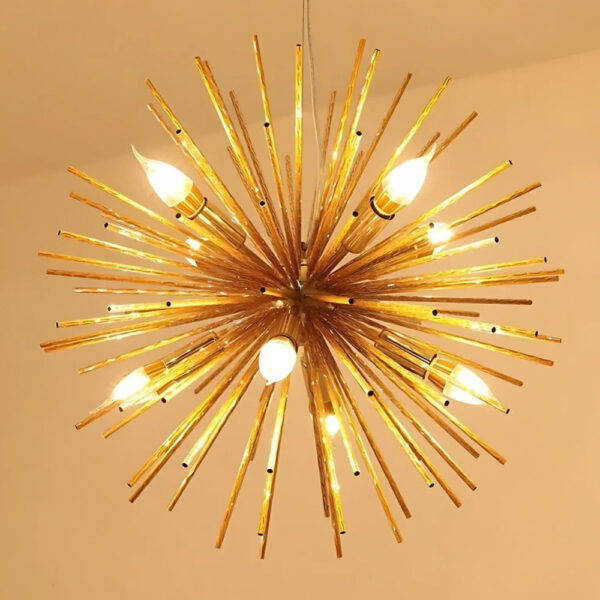Gold dandelion style chandelier with slender spokes and candle style bulbs
