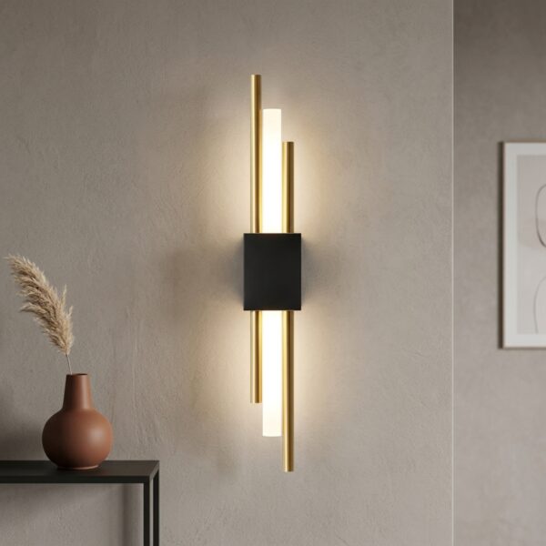 Black and gold wall light with three vertical LED bars