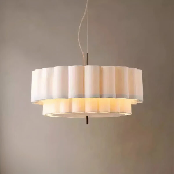 White organic curved pendant light with a round glass ball light source