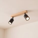 Wood bar and black metal ceiling light with adjustable spots