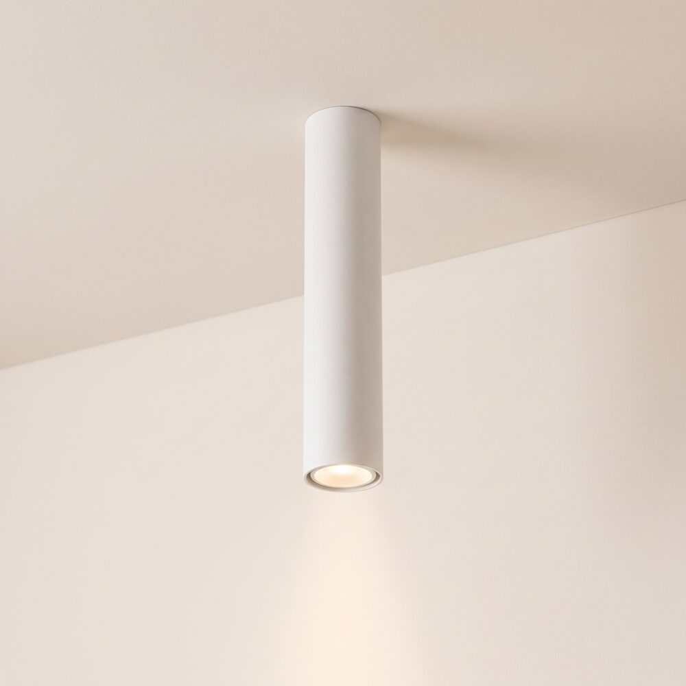 Cylindrical steel ceiling spot in white or black