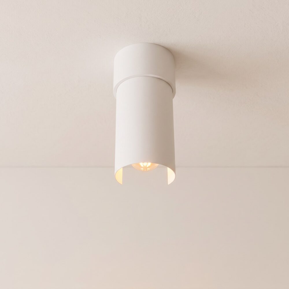 White metal cylinder ceiling light with adjustable head