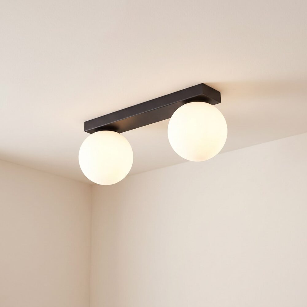 Black bar ceiling light with white glass globes