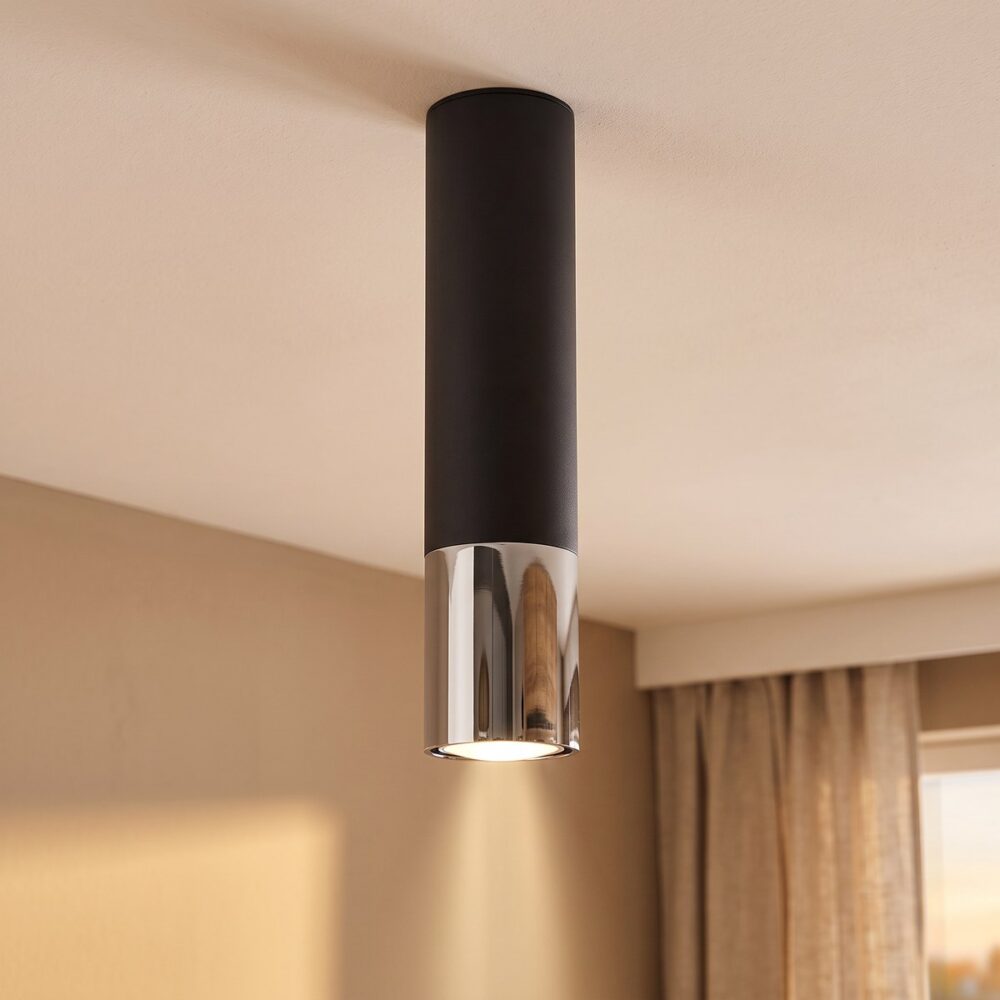 Black tube ceiling spotlight with metal ring