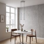 2-tube raw concrete pendant light on a bar