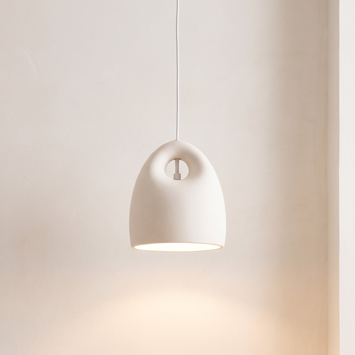 Minimalist ceramic bell pendant light with handle Minimalist white ceramic bell pendant light